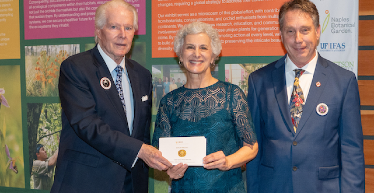 President Barbara A. Farley and professor Lawrence Zettler receiving gold medal for Chelsea Flower Show