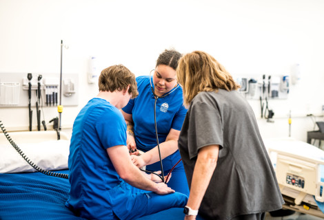Nursing students practicing skills 
