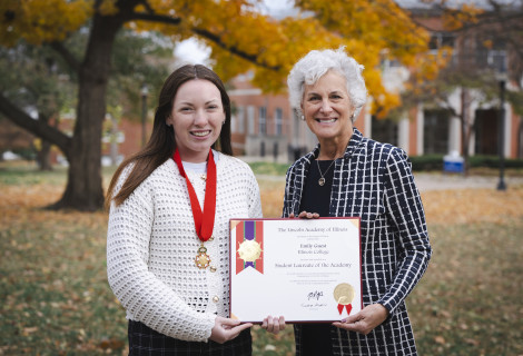 Emily Guest ’26 and President Barbara A. Farley