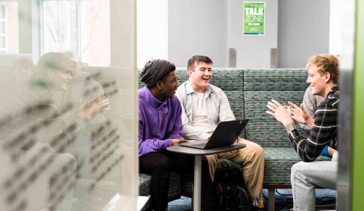 Students talking and smiling